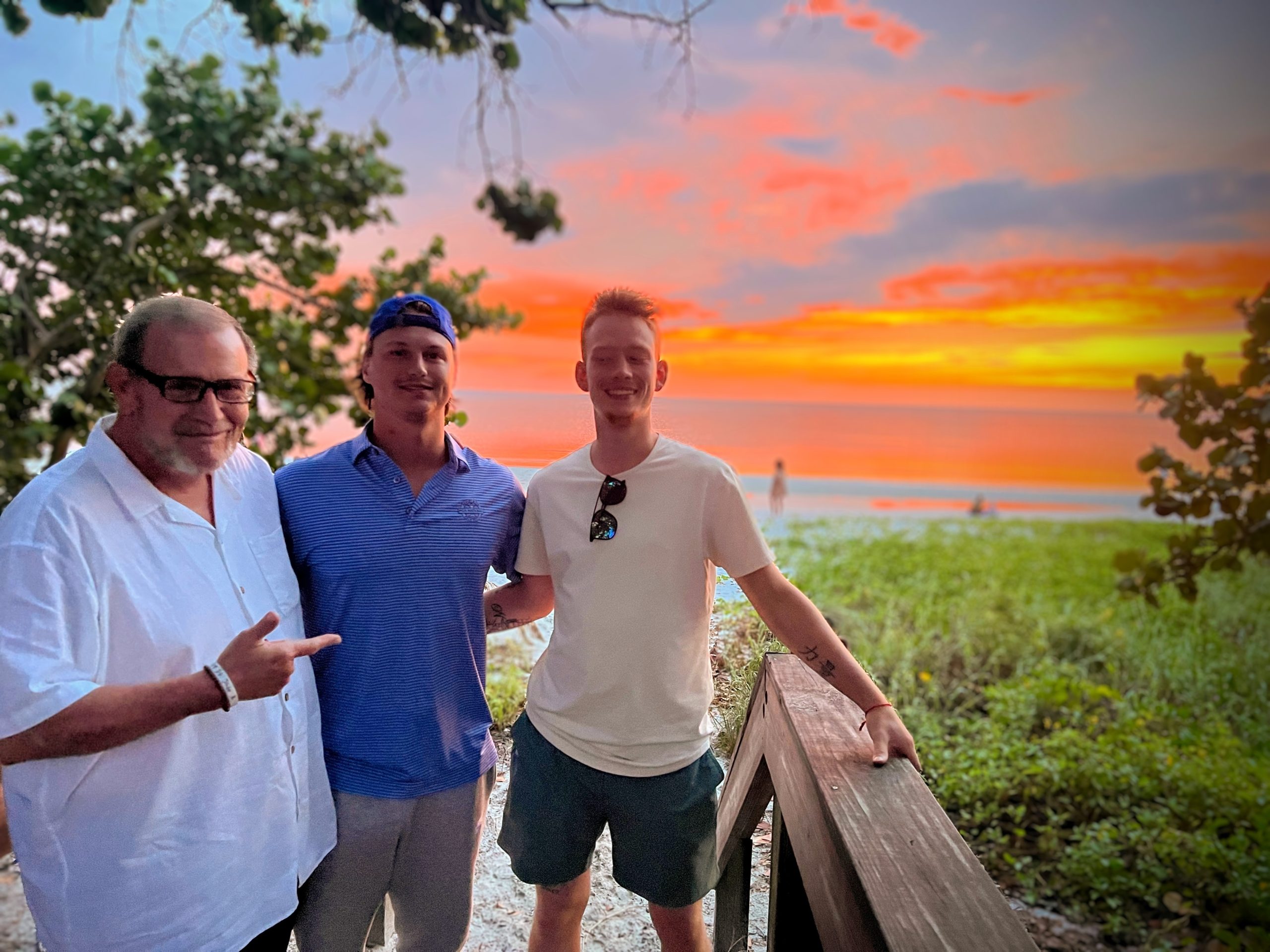 Home 2 Naples Retreat alumni enjoying fellowship at sunset in Southwest Florida